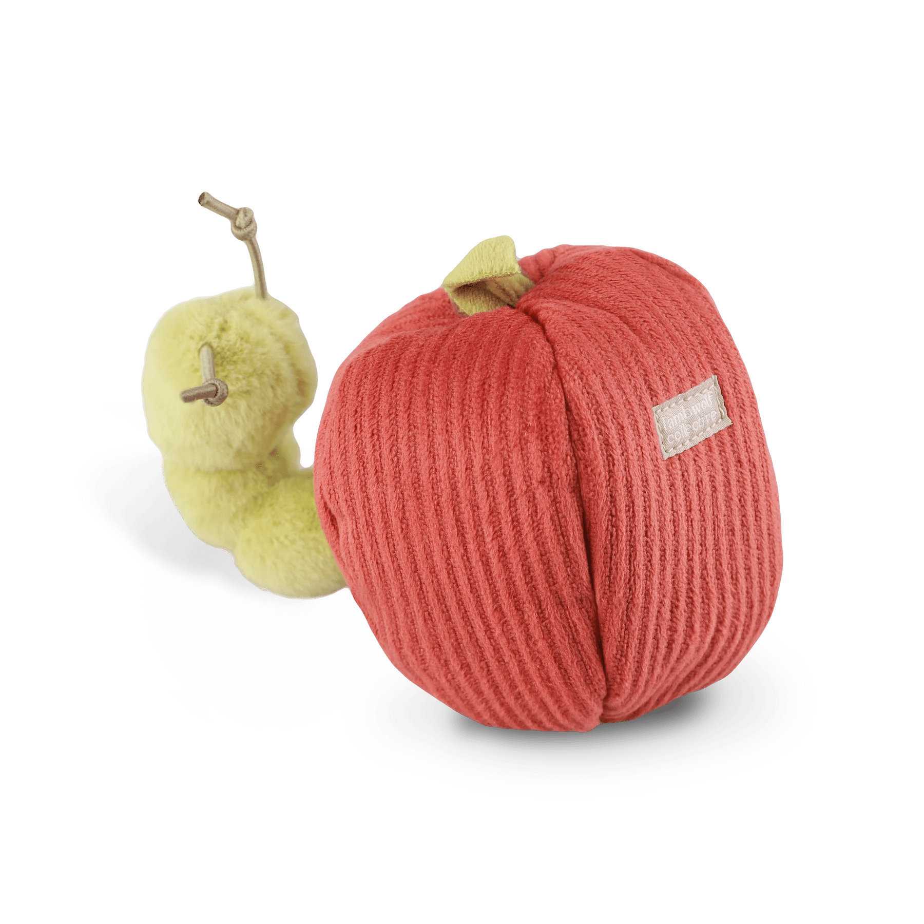Detailansicht des Apple & Caterpillar Hundespielzeugs von Lambwolf Collective mit Apfelschale und Quietschwurm
