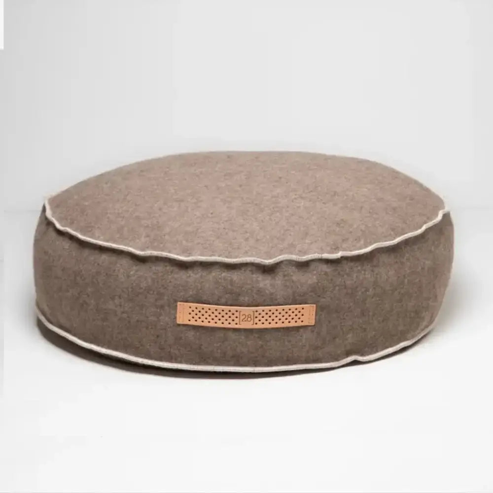 Vogelperspektive auf das Fulvio Hundebett – weiche Bouclé-Oberfläche trifft auf zeitloses Design