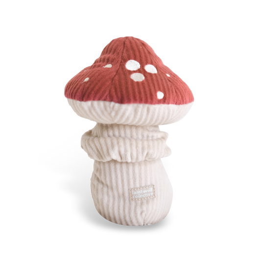 SHROOM Schnüffelspielzeug von Lambwolf – roter Stoffpilz mit weißen Punkten auf weißem Hintergrund